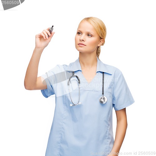 Image of doctor or nurse working with something imaginary