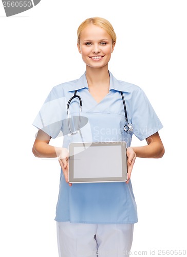 Image of smiling female doctor or nurse with tablet pc