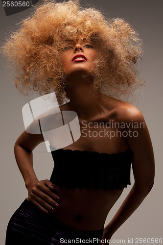 Image of woman with long curly hair