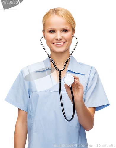Image of smiling female doctor or nurse with stethoscope