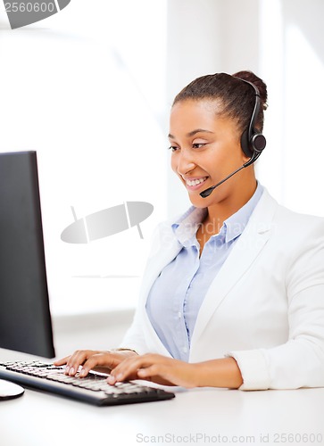 Image of african female helpline operator