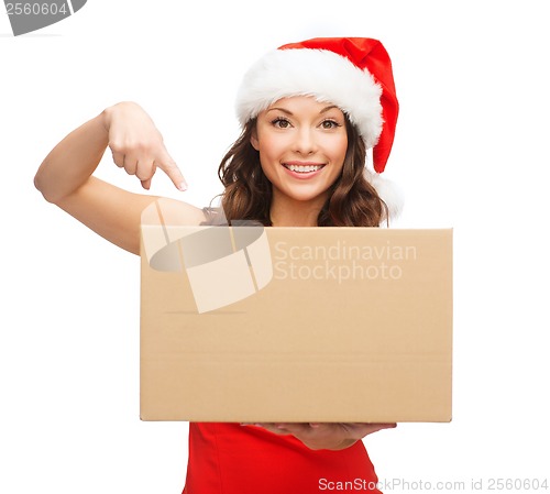 Image of smiling woman in santa helper hat with parcel box