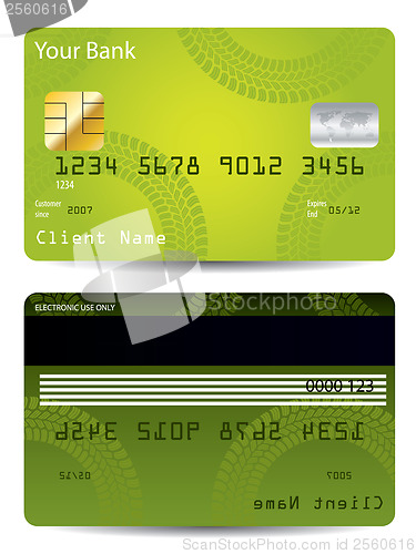 Image of Green credit card with tire track