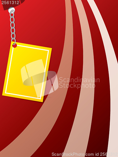 Image of Yellow card chained to a red backdrop 