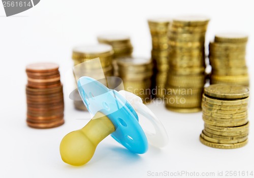 Image of pacifier with hard money