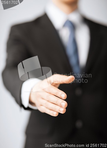 Image of businessman with open hand