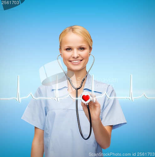 Image of smiling female doctor or nurse with stethoscope