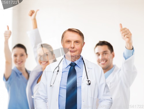 Image of smiling doctor or professor with stethoscope