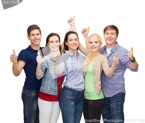 Image of group of smiling students showing thumbs up