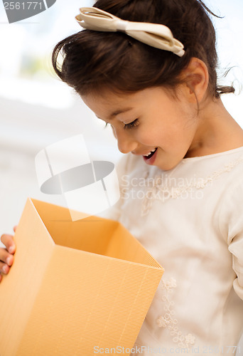 Image of happy child with gift box