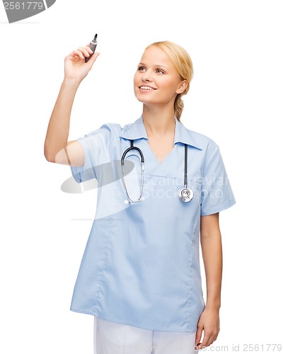 Image of doctor or nurse working with something imaginary