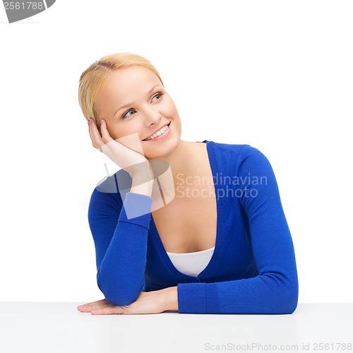 Image of happy woman dreaming