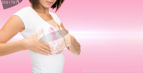 Image of woman with pink cancer awareness ribbon