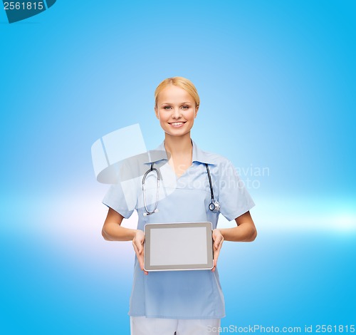 Image of smiling female doctor or nurse with tablet pc
