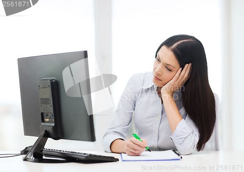 Image of tired businesswoman or student