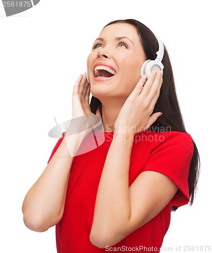 Image of laughing woman with headphones