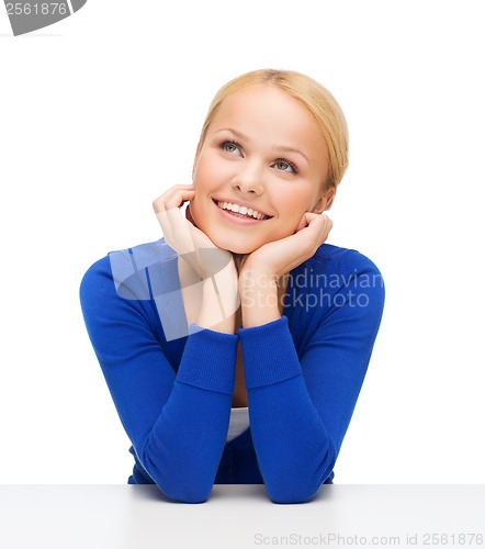 Image of happy woman dreaming