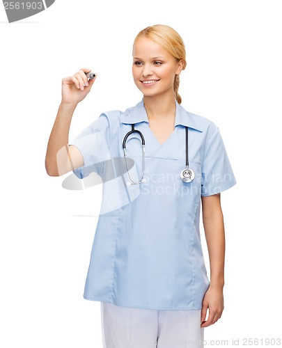 Image of doctor or nurse working with something imaginary