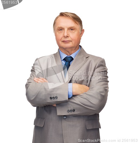 Image of serious businessman or teacher in suit