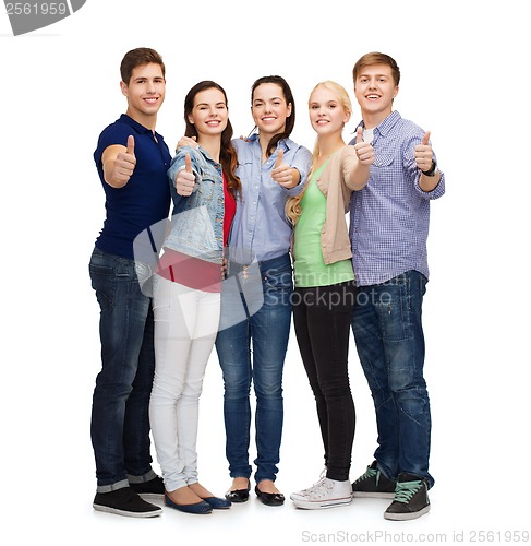 Image of group of smiling students showing thumbs up