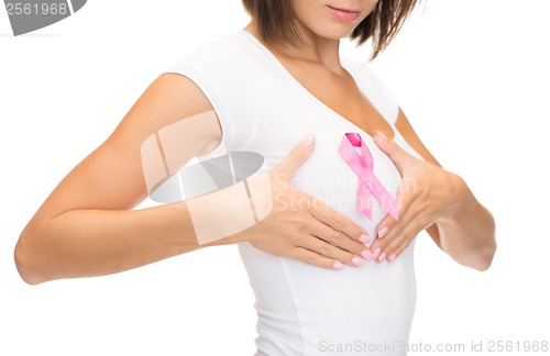 Image of woman with pink cancer awareness ribbon