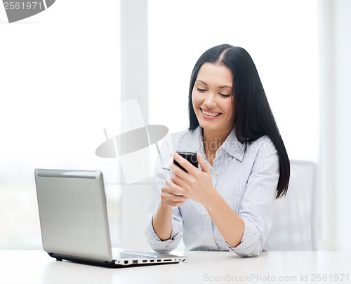 Image of smiling businesswoman or student with laptop