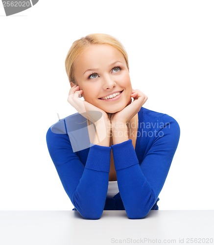 Image of happy woman dreaming