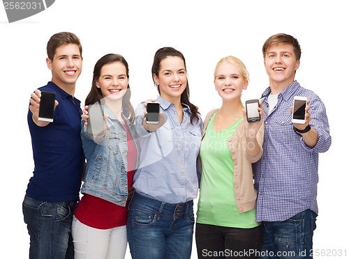 Image of students showing blank smartphones screens