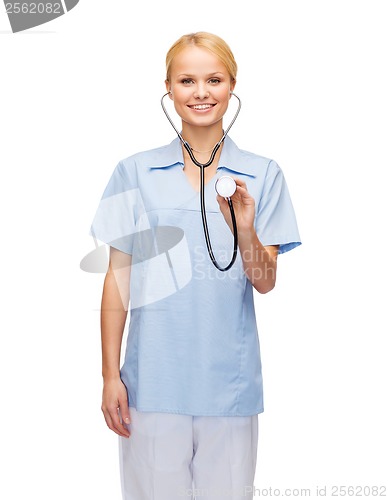 Image of smiling female doctor or nurse with stethoscope