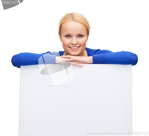 Image of woman in casual clothes with blank white board