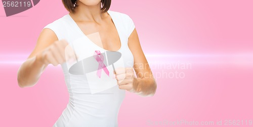 Image of woman with pink cancer awareness ribbon