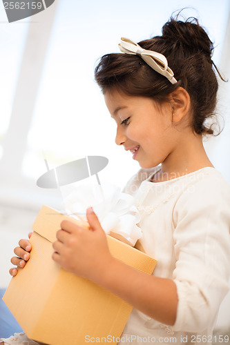 Image of happy child with gift box