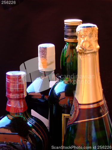 Image of Wine, whiskey, and Champagne bottles
