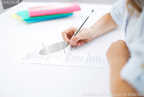 Image of little girl taking test