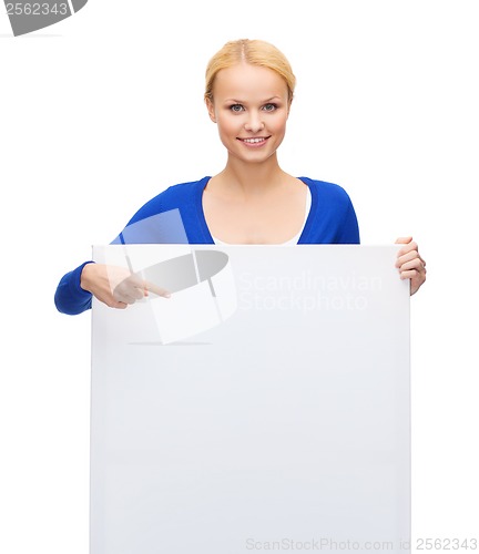 Image of woman in casual clothes with blank white board