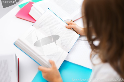 Image of student girl studying at school