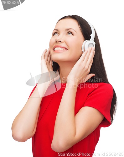 Image of smiling woman with headphones