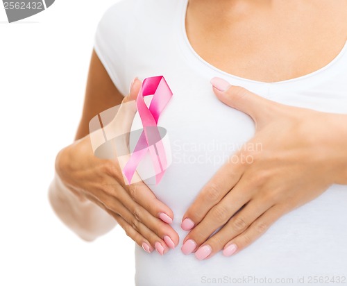 Image of woman with pink cancer awareness ribbon