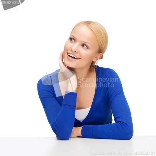 Image of happy woman dreaming and laughing