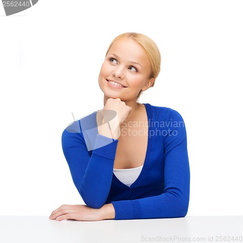 Image of happy woman dreaming