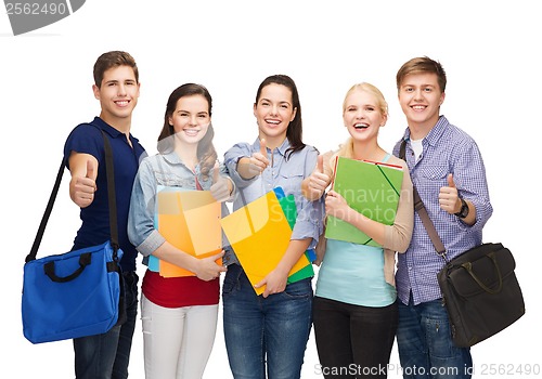 Image of group of smiling students showing thumbs up