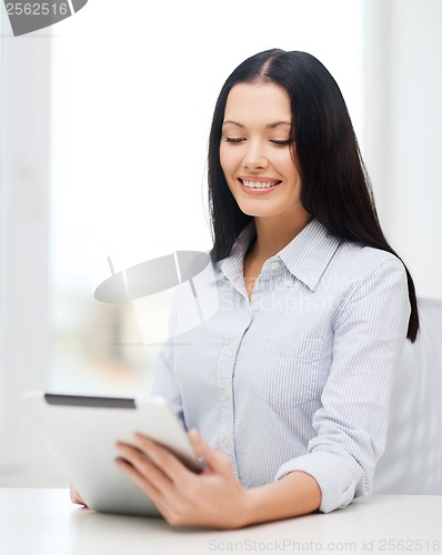 Image of smiling businesswoman or student with tablet pc