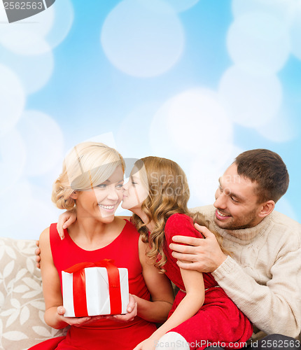 Image of adorable child kisses her mother