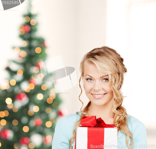 Image of happy woman with gift box