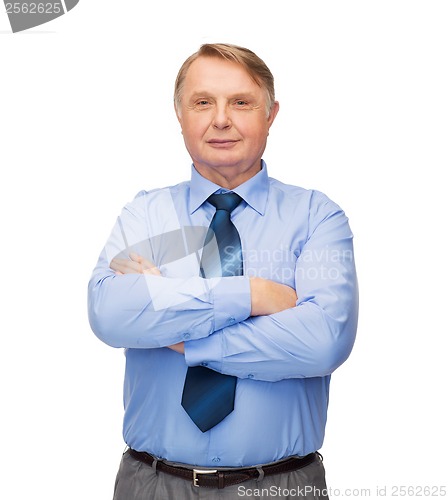 Image of smiling businessman or teacher