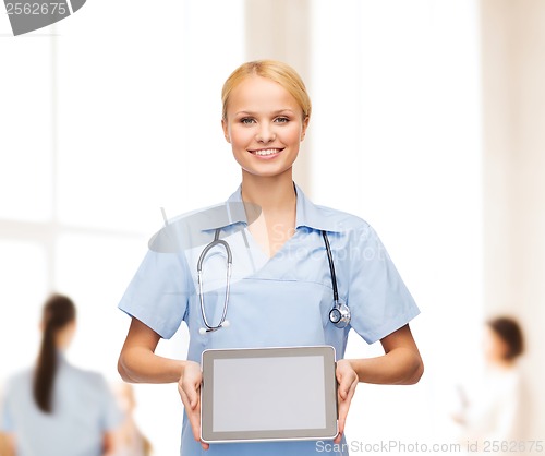 Image of smiling female doctor or nurse with tablet pc