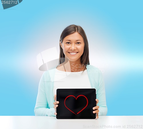 Image of smiling woman with tablet pc