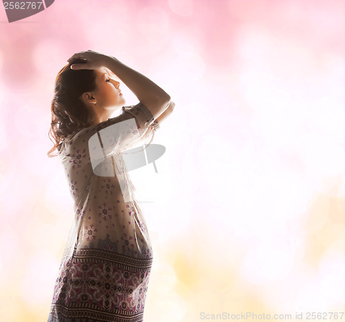 Image of silhouette picture of pregnant beautiful woman