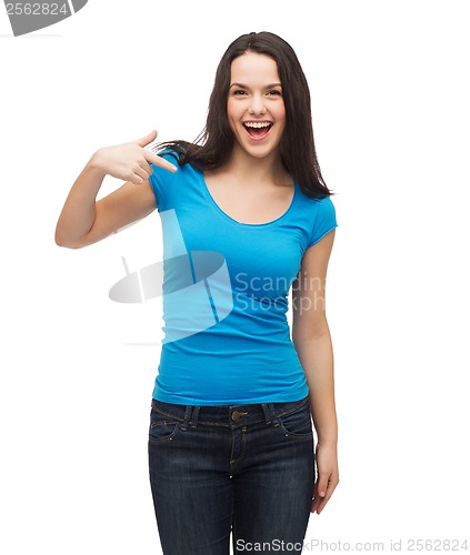 Image of smiling girl in blank blue t-shirt