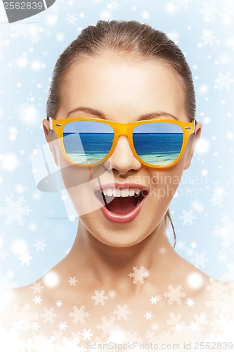 Image of happy screaming teenage girl in shades